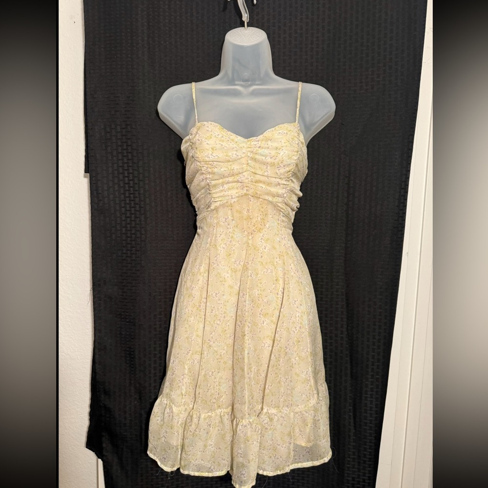 Light green spaghetti strap dress with dainty floral pattern